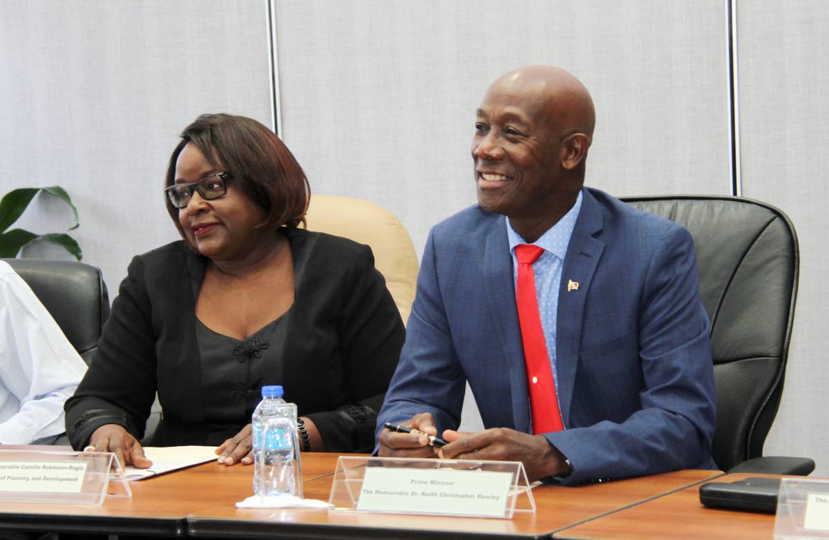 Prime Minister Dr. Keith Rowley alongside Camille Robinson-Regis